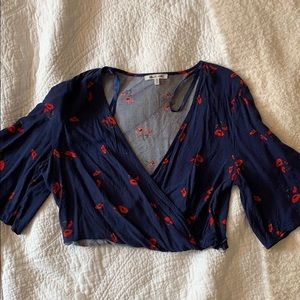 Cropped quarter inch bell sleeve blouse